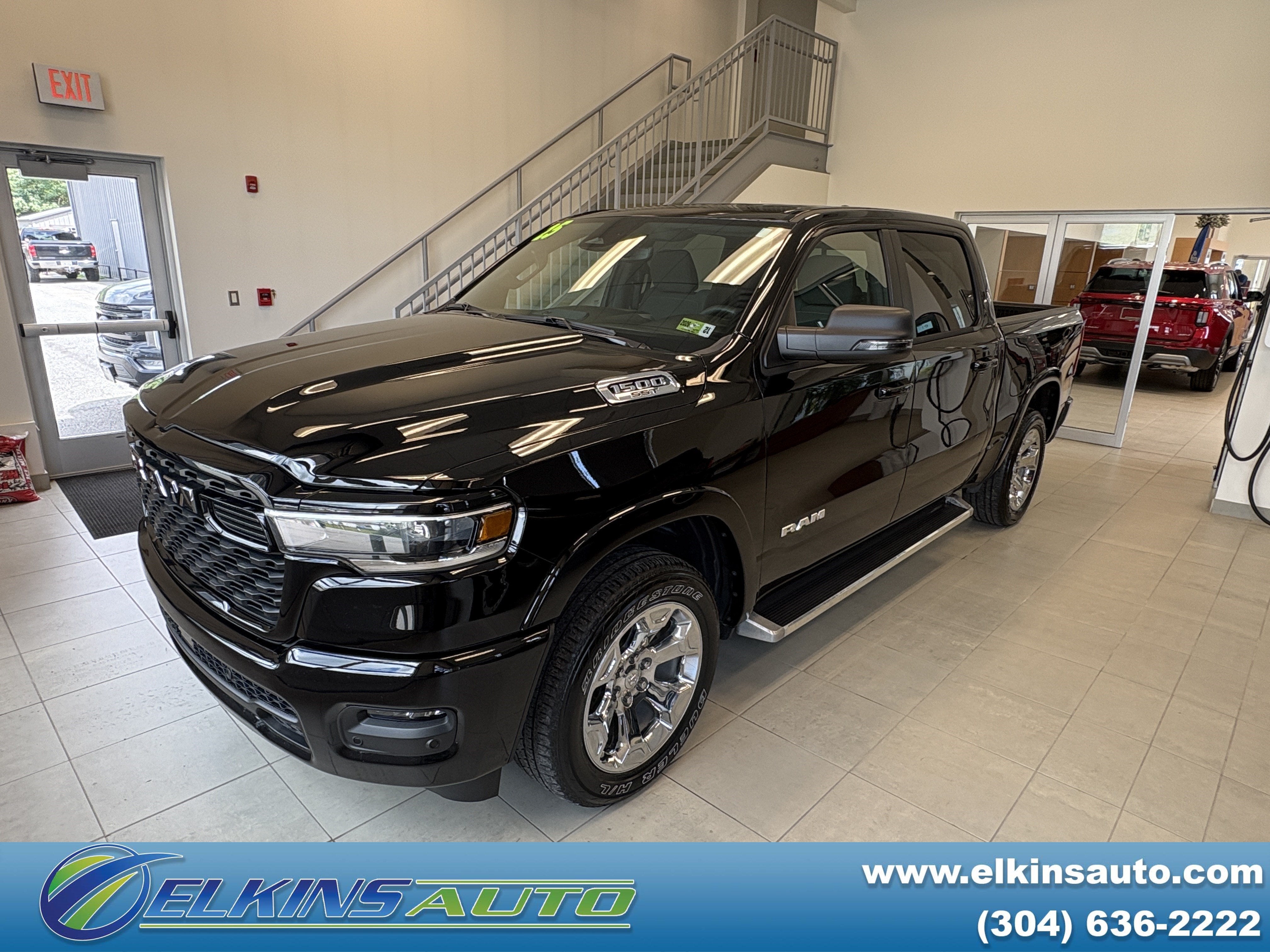 2025 RAM 1500 Big Horn in Diamond Black Crystal Pearlcoat — front three-quarter view