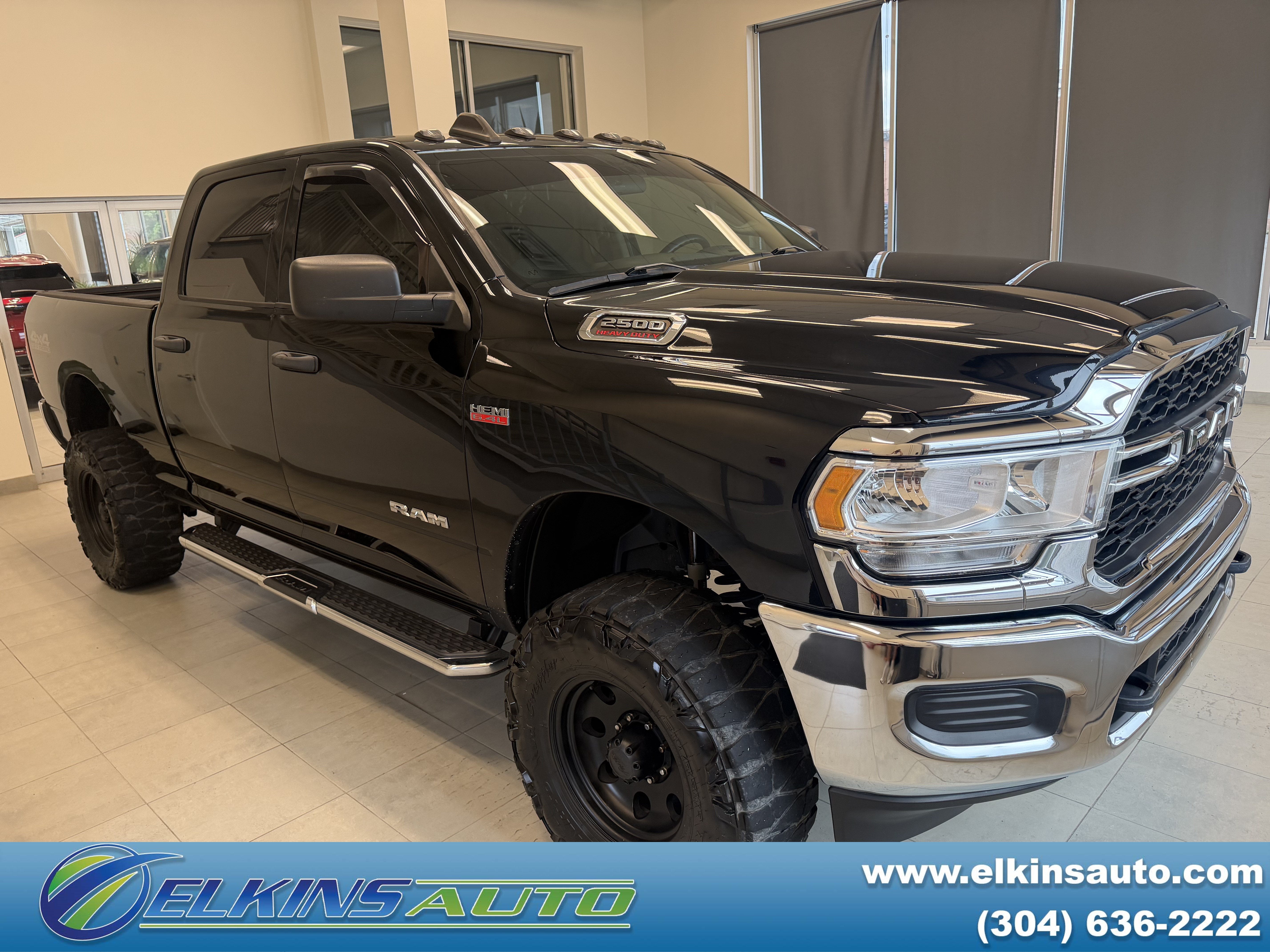 2020 RAM 2500 Tradesman in Diamond Black Crystal Pearlcoat — front three-quarter view