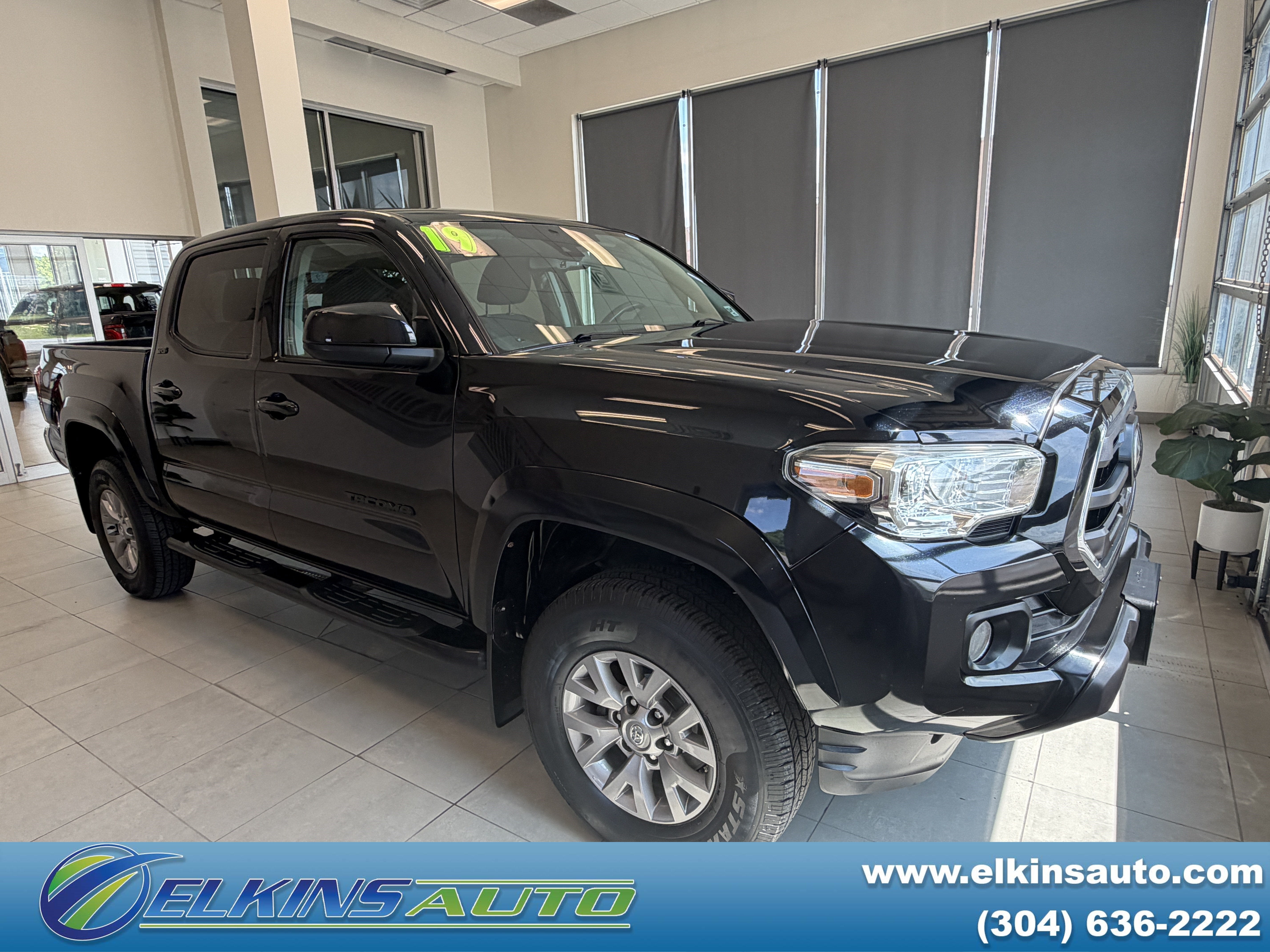 2019 Toyota Tacoma SR5 in Black — front three-quarter view