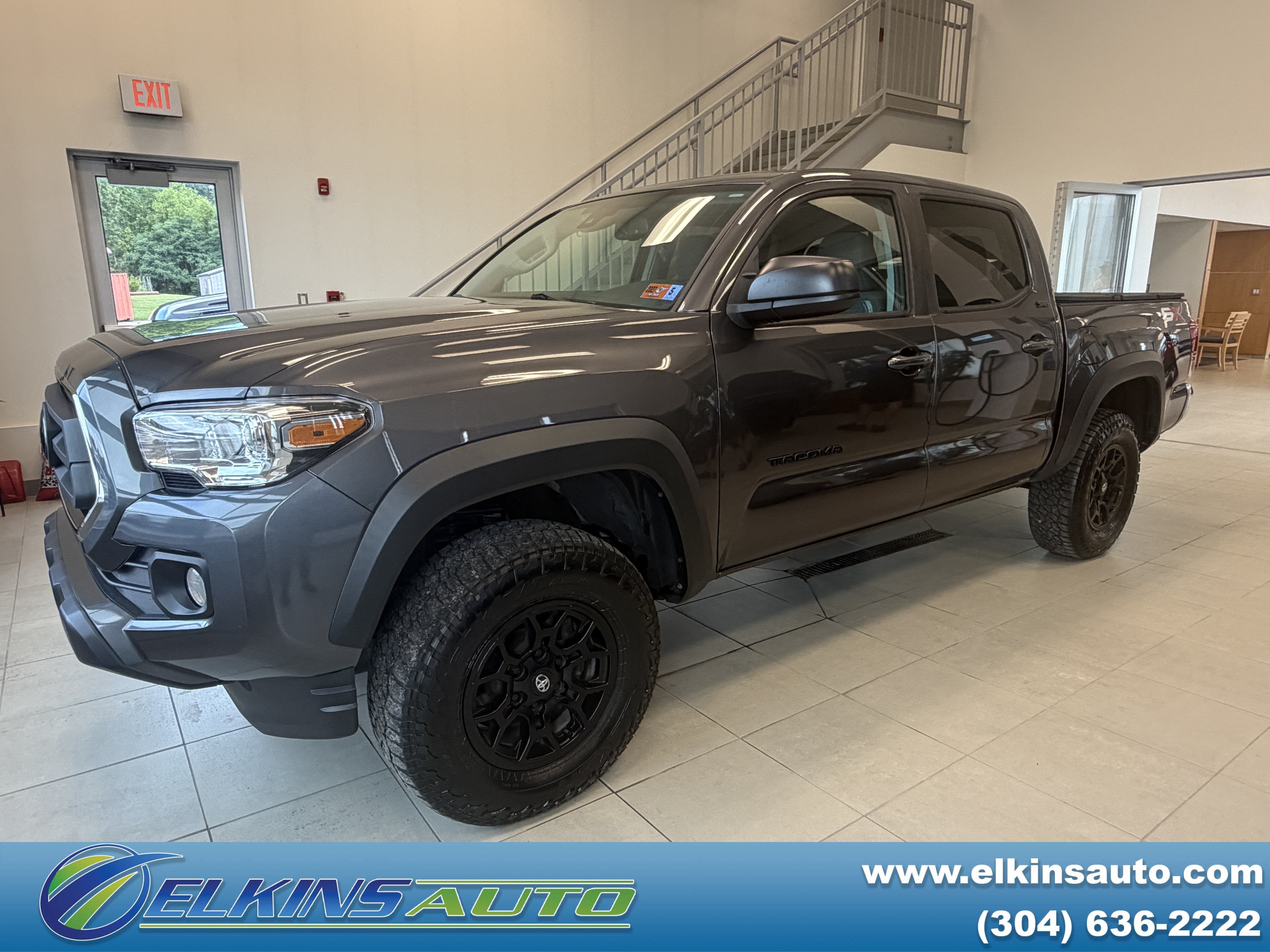 2023 Toyota Tacoma Base in Black — front three-quarter view